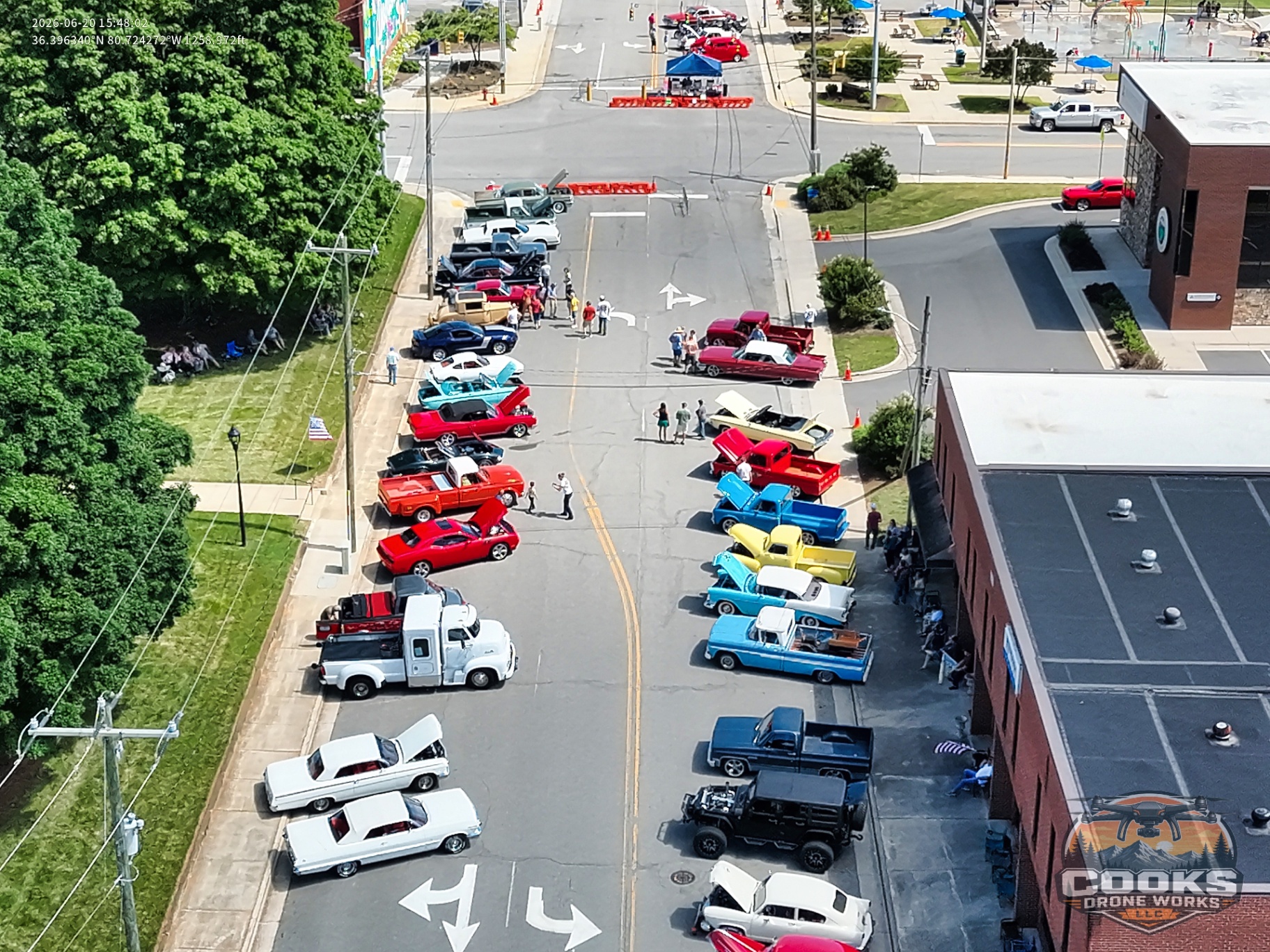 Overhead drone photo of a downtown classic car show